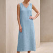 Blue FJØRNA women's elegant midi dress with V-neck and sleeveless design, perfect for stylish occasions.