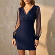 Blue FJØRNA women's V-neck wrap mini dress with elegant design, perfect for stylish occasions.