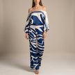 Blue FJØRNA women's two-piece print wide-leg co-ord set featuring a stylish top and matching wide-leg pants.