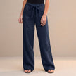 Blue high waist summer trousers for women by FJØRNA, made of cotton, stylish and comfortable for warm weather.