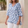 Blue FJØRNA women's mini dress with v-neck and ruffle details, stylish and elegant for casual or dressy occasions.