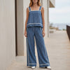FJØRNA coastal stripe sleeveless top and wide-leg pant set in blue, featuring a breezy, casual summer look.