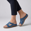 Blue FJØRNA orthopedic open-toe slide sandals for women, featuring supportive design and comfortable open-toe style.
