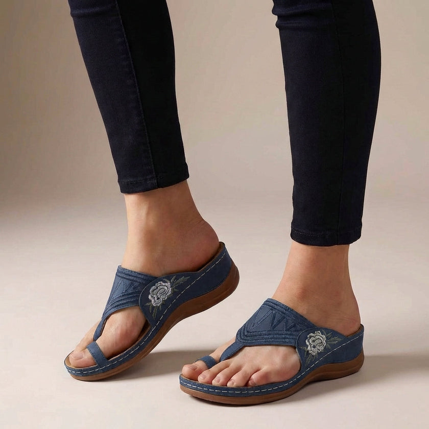 Blue FJØRNA orthopedic floral embroidered wedge sandals for women, featuring colorful flower embroidery and comfortable wedge heel.