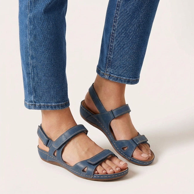 Blue FJØRNA orthopedic comfort fit sandals with adjustable strap and open toe design.