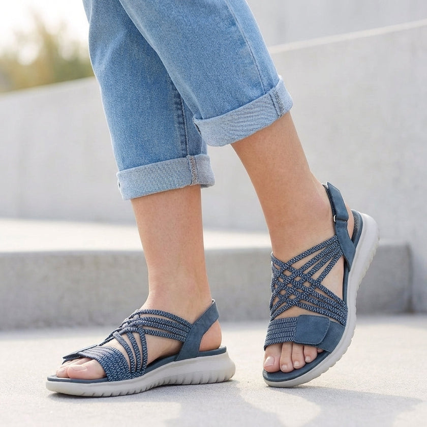 Blue FJØRNA orthopedic criss-cross strappy women's sandals with adjustable fit and supportive design.