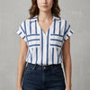 Blue striped FJØRNA women's summer blouse with V-neck, lightweight top for casual and warm-weather wear.