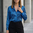 Blue FJØRNA summer blouse for women with print, long sleeves, casual top perfect for warm weather and stylish looks