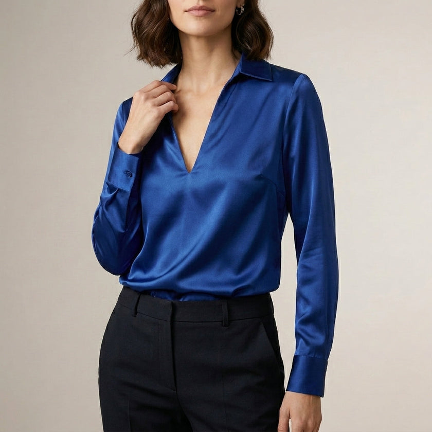 Blue FJØRNA women's satin summer blouse with V-neck, long sleeves, and high waist, stylish and elegant top for warm weather.