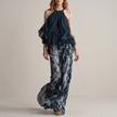 FJØRNA Midnight Mist halter blouse and flowing pant set in blue, stylish 2-piece ensemble with elegant, relaxed fit.
