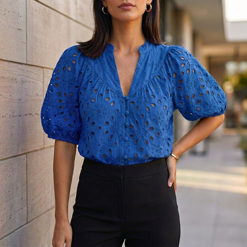 Blue women's V-neck linen blouse by FJØRNA featuring button front and casual summer style, perfect for warm weather.