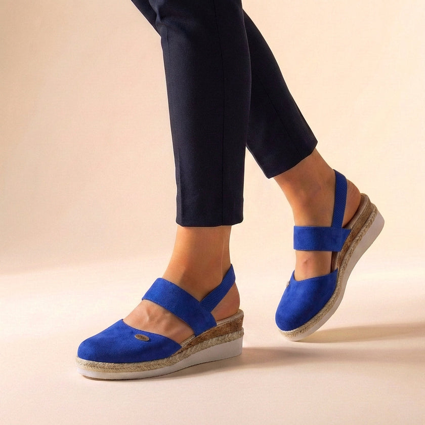 Blue FJØRNA orthopedic platform espadrille sandals for women with woven jute soles and adjustable ankle straps.