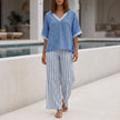 Blue FJØRNA women's summer two-piece set with striped high waist co-ord, featuring a matching top and skirt.