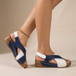 Blue FJØRNA orthopedic criss-cross slingback wedge sandals for women with supportive straps and a comfortable wedge heel.