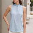 Blue FJØRNA women's sleeveless V-neck summer blouse with high waist, lightweight and stylish top for warm weather wear.