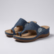 Blue FJØRNA orthopedic floral embroidered wedge sandals for women, featuring colorful floral embroidery and comfortable design.
