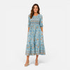 Women's floral midi dress by FJØRNA featuring a summer casual design with vibrant floral patterns and a flowing silhouette.