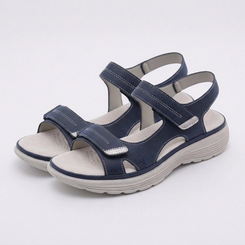 FJØRNA orthopedic comfort fit sandals with chunky sole and adjustable straps, featuring blue color and cushioned footbed.