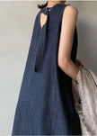 FJØRNA bohemian navy V-neck cold shoulder sleeveless cotton denim dress, casual wedding attire with relaxed fit and stylish design.