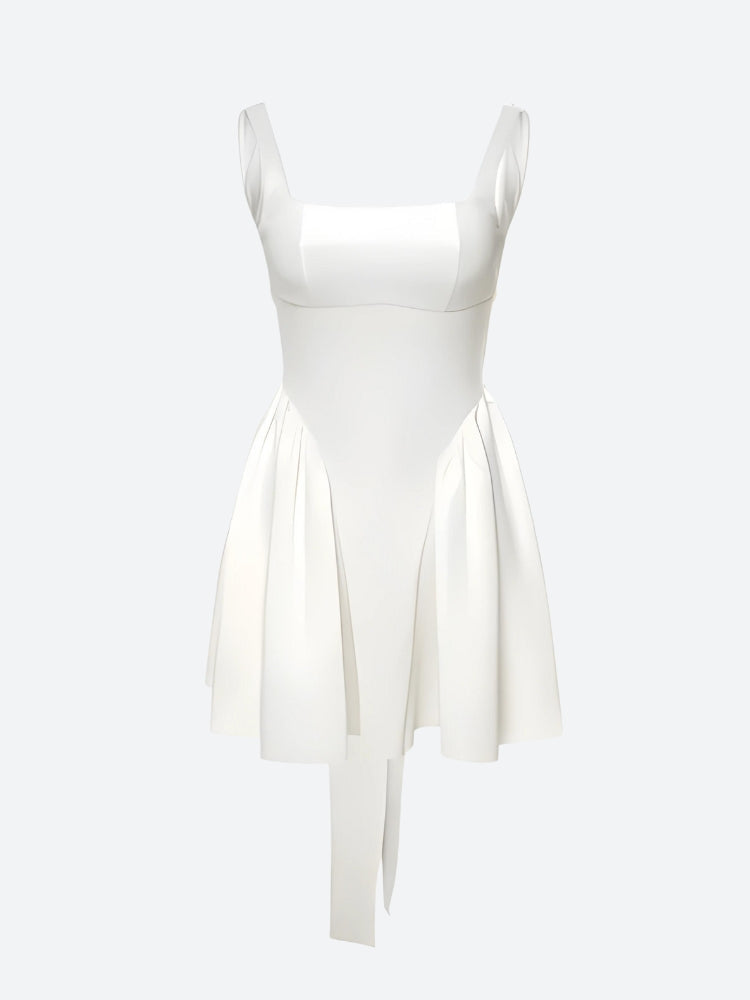 White FJØRNA bow waist backless mini dress displayed on a model, showcasing its stylish backless design and feminine bow detail.