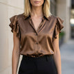 Brown satin ruffle summer blouse for women by FJØRNA, stylish women's top with elegant ruffle detailing.