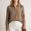 FJØRNA women's summer blouse in brown with white stripes, long sleeves, and button front, casual stylish top for warm weather.