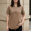 Brown denim women's summer top by FJØRNA with button-front design, casual and stylish for warm weather.