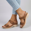 Brown FJØRNA women's orthopedic heeled sandals with wedge heel and adjustable strap, showcasing stylish and supportive footwear.