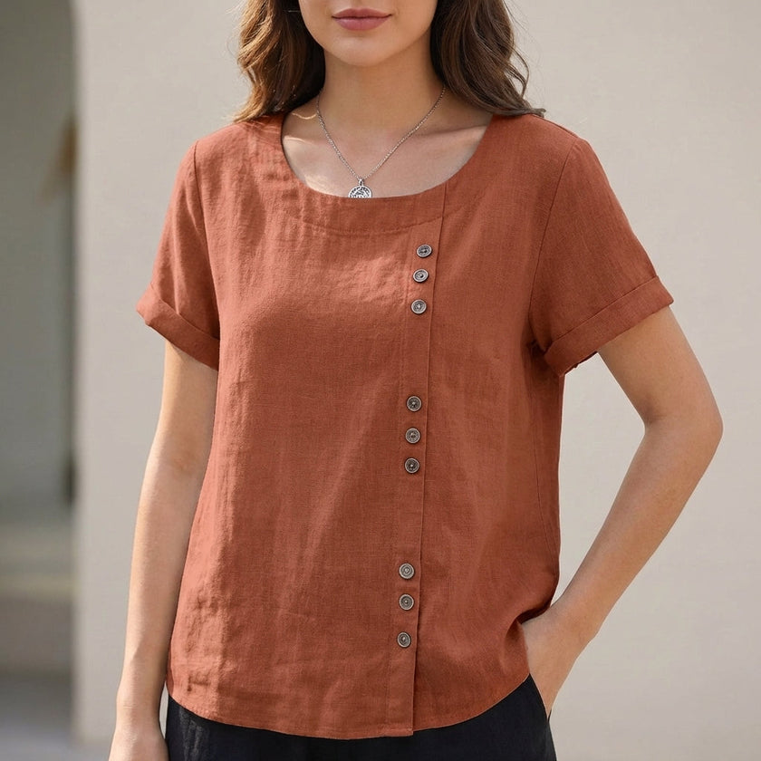 Brown FJØRNA relaxed linen blouse for women with asymmetric detail, casual daywear top perfect for comfortable, stylish outfits.