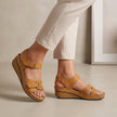 Brown orthopedic open toe wedge heel sandals by FJØRNA with comfort fit, featuring supportive design and stylish appearance.