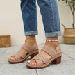 FJØRNA orthopedic platform block heel sandals in brown with open toe and cut-out design, showcasing stylish and supportive footwear.
