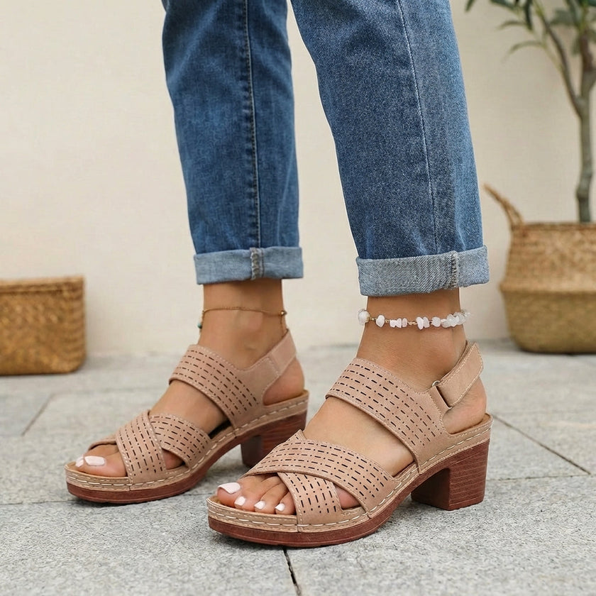 FJØRNA orthopedic platform block heel sandals in brown with open toe and cut-out design, showcasing stylish and supportive footwear.