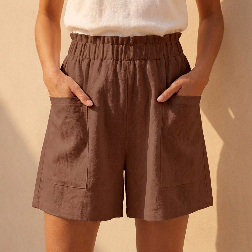 FJØRNA women's summer linen shorts with pockets in brown, casual style perfect for warm weather and everyday wear.