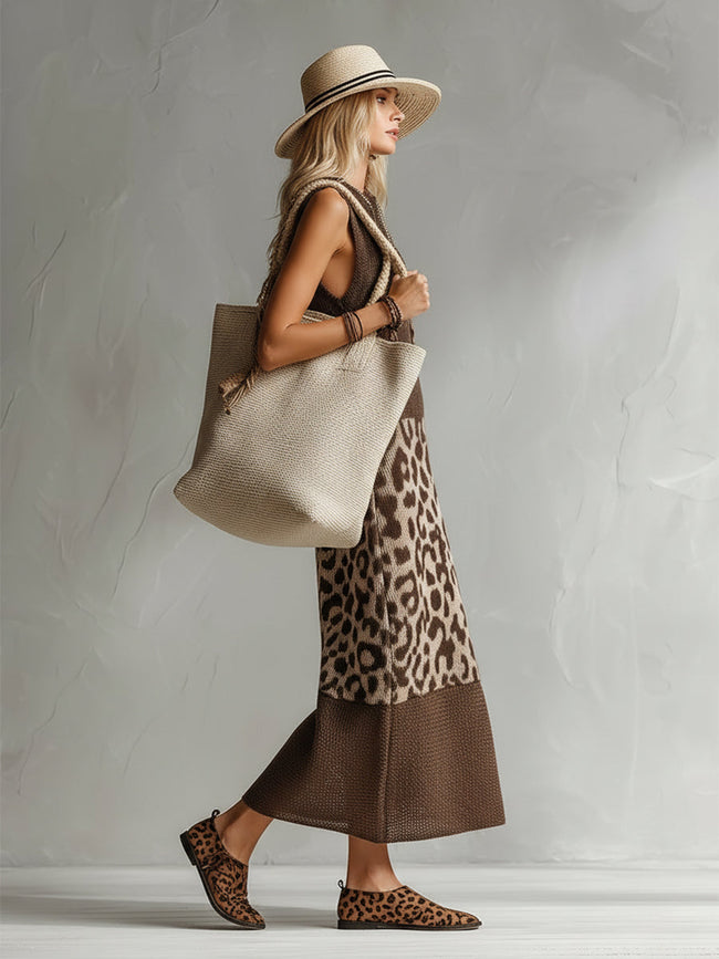 Brown knit leopard print maxi dress by FJØRNA featuring long sleeves and a flowing silhouette for elegant evening wear.