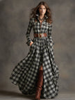 Brown FJØRNA maxi dress, casual style, flowing fabric, sleeveless design, and ankle-length silhouette.