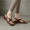 Brown FJØRNA square toe block heel criss-cross sandals for women, featuring stylish straps and a comfortable chunky heel.