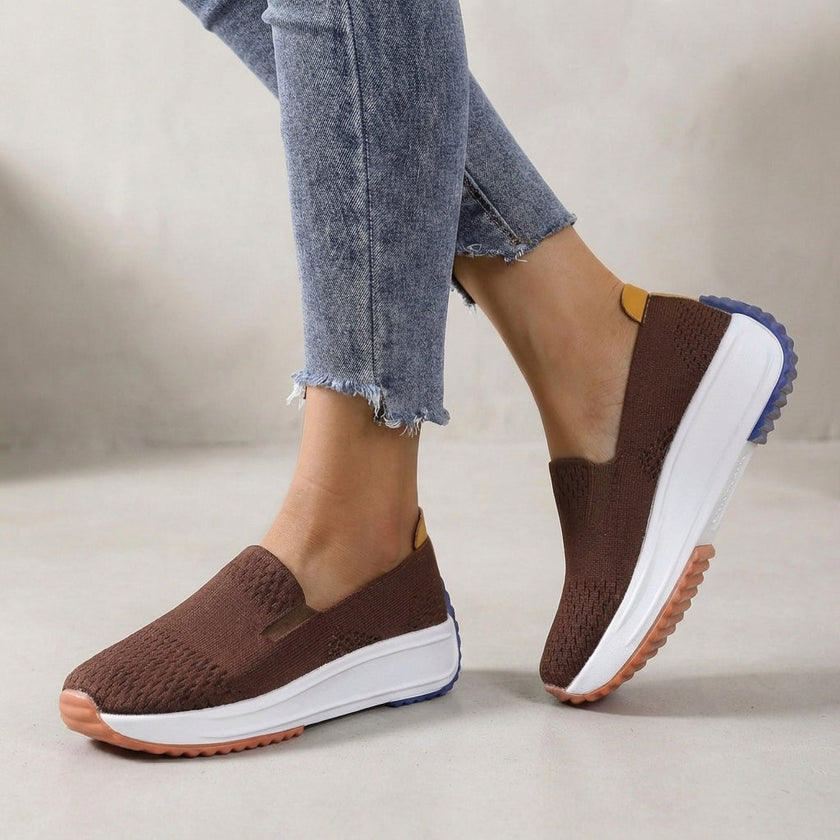 Brown FJØRNA women's orthopedic sneakers with knit upper and arch support, showcasing a comfortable, supportive shoe design.