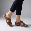 FJØRNA orthopedic open toe wedge sandals with T-strap and rhinestones, featuring a brown leather finish and comfortable design.