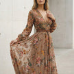 Close-up of FJØRNA embroidered brown belted A-line collared maxi dress for women, showcasing detailed embroidery and fabric texture.