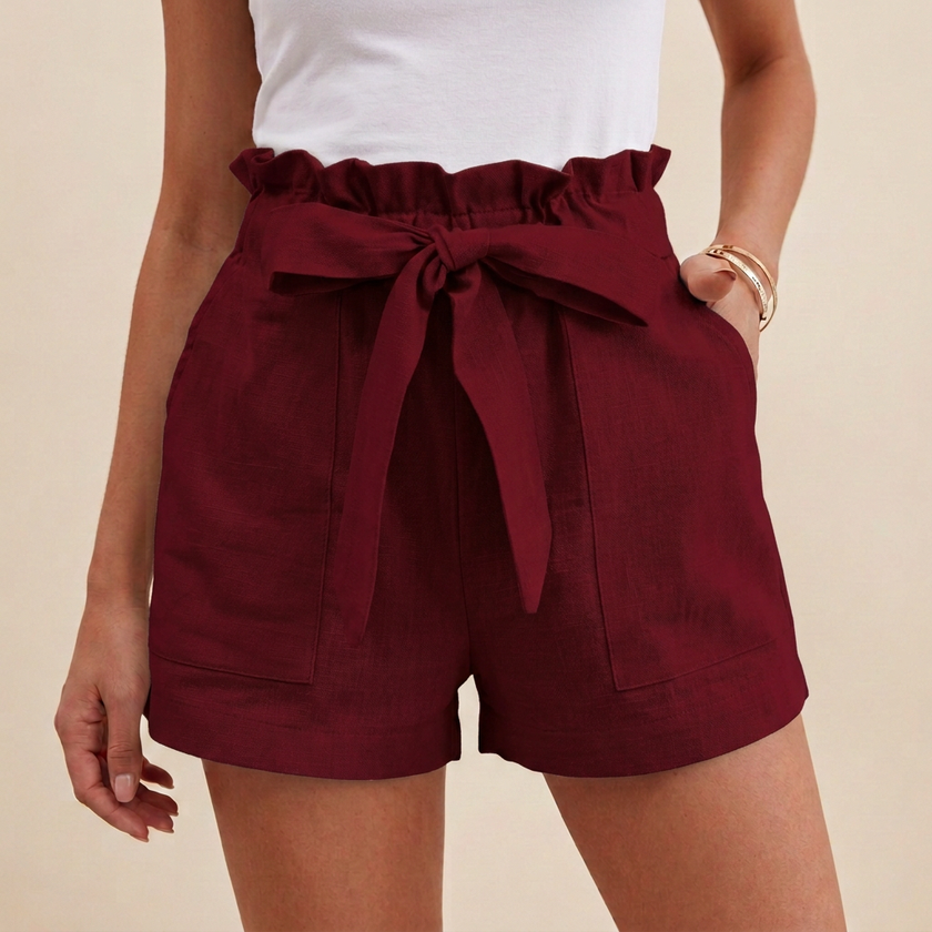 Burgundy linen summer shorts for women with high waist and pockets by FJØRNA, casual and stylish for warm weather.