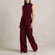 FJØRNA burgundy sleeveless high-neck two-piece set with flowing wide-leg trousers, elegant and sophisticated for stylish occasions.