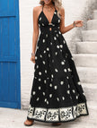FJØRNA printed halter flowy maxi dress in white, featuring a relaxed fit and elegant design, perfect for summer wear.