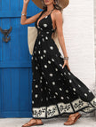 FJØRNA printed halter flowy maxi dress in white with a relaxed fit, featuring a stylish halter neckline and lightweight fabric.