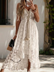 FJØRNA white lace strappy resort-style long dress with intricate lace details and flowing silhouette, perfect for warm-weather occasions.