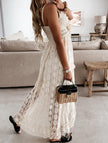 White lace strappy long dress by FJØRNA featuring resort-style design and elegant flowy fabric.