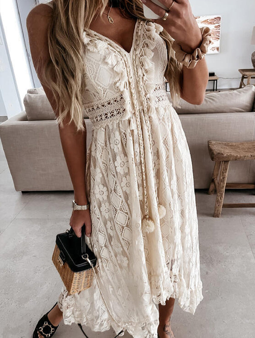 White lace strappy long dress by FJØRNA featuring resort-style design and delicate detailing, perfect for warm-weather occasions.