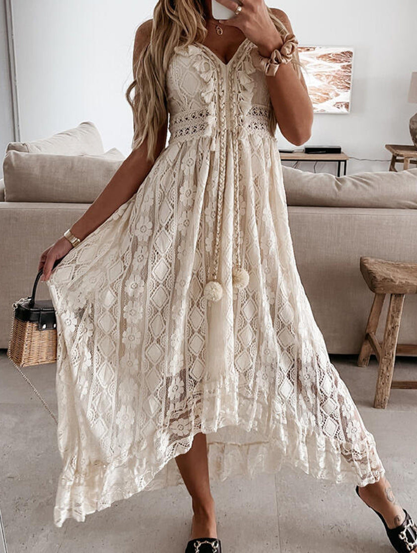 FJØRNA resort-style white lace strappy long dress with a flowing silhouette, perfect for summer or special occasions.
