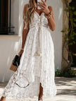 White resort-style lace strappy long dress by FJØRNA, featuring a flowy design and intricate lace details perfect for warm-weather occasions.