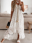 White lace strappy long dress by FJØRNA featuring resort-style design and elegant flowy fabric, perfect for summer or special occasions.