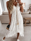 White FJØRNA resort-style lace strappy long dress with delicate lace details and flowing fabric, perfect for elegant occasions.